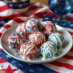 How to Make Patriotic Oreo Balls for Any Celebration 6 Patriotic Oreo Balls decorated with red, white, and blue sprinkles